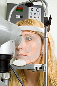 Young woman having eye test