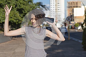 Young woman having fun while listening to music