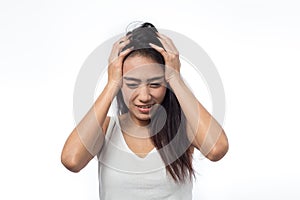 Young woman having headache on a white background
