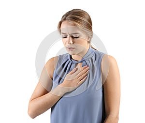 Young woman having heart attack on white background