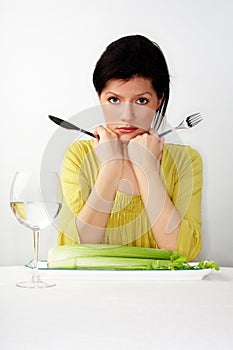 Young woman having her breakfast