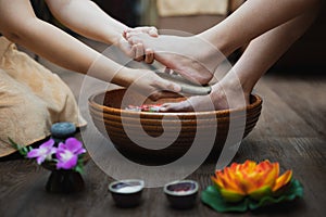 Young woman having her feet scrubbed in beauty salon, Female feet at spa pedicure procedure, Spa foot massage, Massage of woman`s