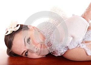 Young woman having massage in hamam.