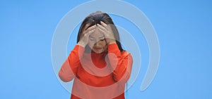 Young woman having migraine