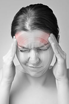 Young woman having migraine