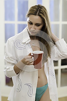 Young woman having a morning coffee