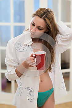Young woman having a morning coffee
