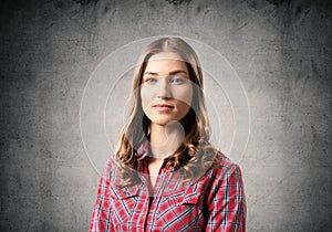 Young woman having serious and calm face