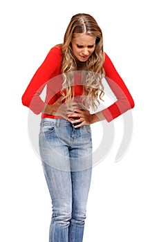 Young woman having terrible pain in stomach