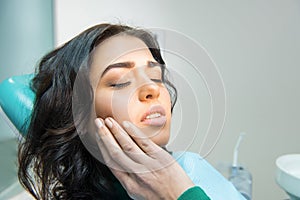 Young woman having toothache.