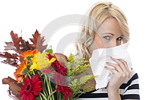 Young Woman with Hayfever Holding a Bunch of Flowers