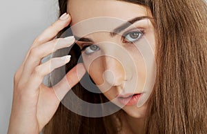 Young woman with headache.