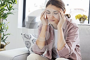 Young woman with headache