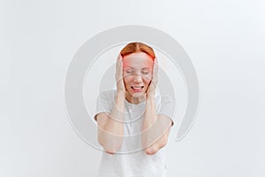 Young woman with headache. Red mark. Pain in head, temple, problem with pressure. Headache migraine,eye pain. White background