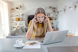 Young woman with headache photo