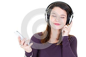 Young woman with headphones eyes closed and mobile phone