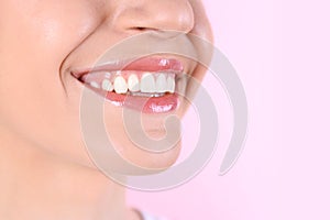 Young woman with healthy teeth and beautiful smile