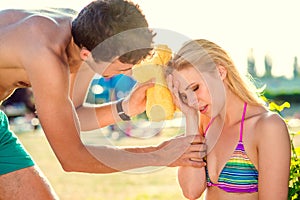 Young woman with heatstroke photo