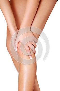 Young woman heaving knee injury