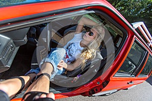 Young Woman in her Car