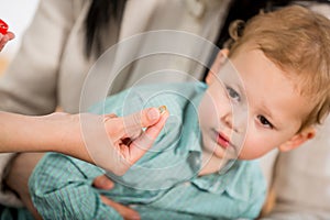 Young woman and her child at the doctor homeopaths