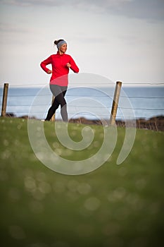 Young woman on her evening jog