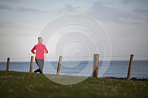 Young woman on her evening jog