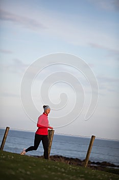 Young woman on her evening jog