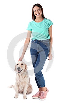 Young woman and her Golden Retriever dog