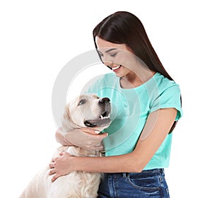 Young woman and her Golden Retriever dog on background