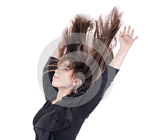 Young woman with her hair flying in the air