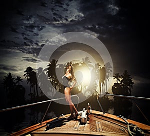 Young woman on her private yacht