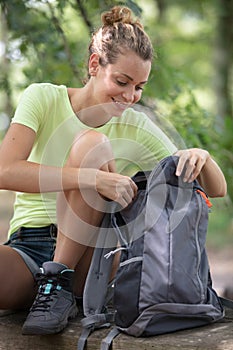 young woman hiking in forest