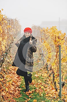 Young woman hiking in Lavaux vineyards in autumn