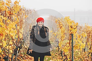 Young woman hiking in Lavaux vineyards in autumn