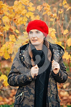 Young woman hiking in Lavaux vineyards in autumn