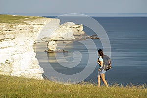 Young woman hiking at seaside