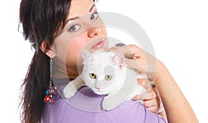 Young woman hold white cat.