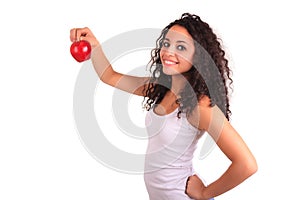 Young woman holding apple. Isolated over white