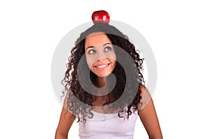 Young woman holding apple. Isolated over white