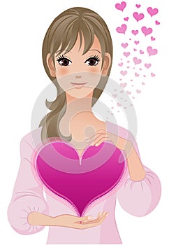 Young woman holding big heart