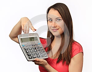 Young woman holding a calculator