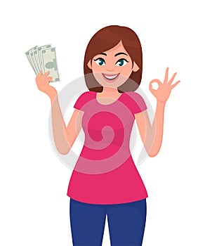 Young woman holding cash/currency/money in hand and showing OKAY sign. Human emotion and body language concept illustration.