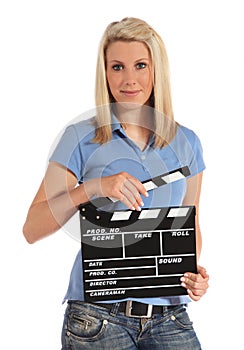 Young woman holding clapperboard