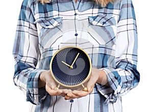 Young woman holding clock on white backgroun