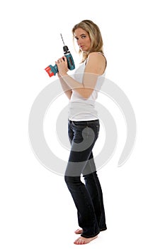 Young woman holding a cordless drill