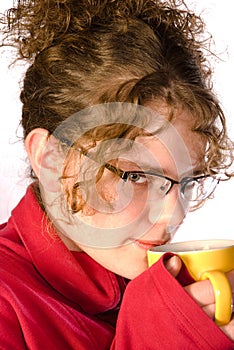 Young woman holding cup of tea