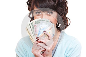 Young woman holding dollars and euro