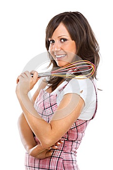 Young woman holding egg beater