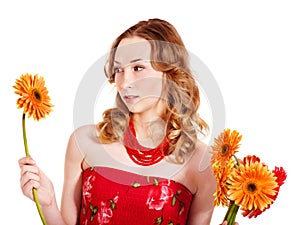 Young woman holding flowers.